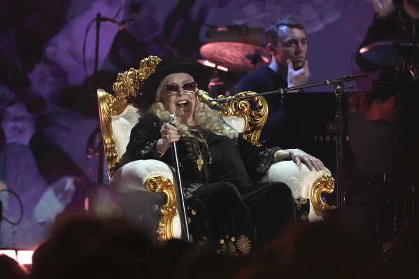 Joni Mitchell performs during the FireAid benefit concert on Thursday, Jan. 30, 2025, at The Forum in Inglewood, Calif. (AP Photo/Chris Pizzello)